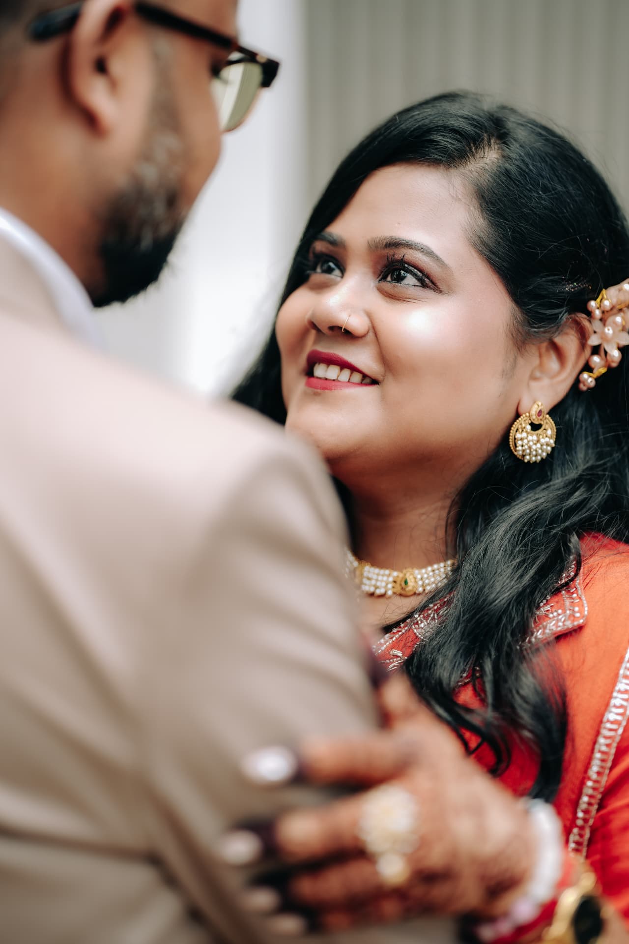 Survi smiling up at Kunal